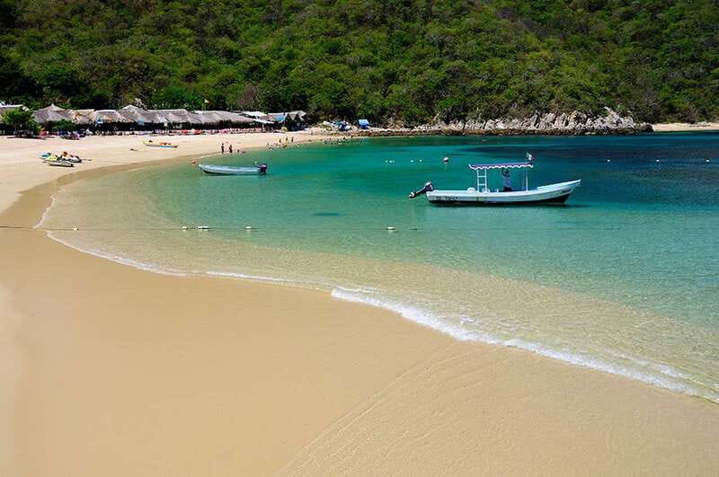 Huatulco: Premium Boat Tour with snorkel experience. - Cacaluta Bay and Maguey Beach: drinks onboard, plus the Rostro Mixteco photo stop