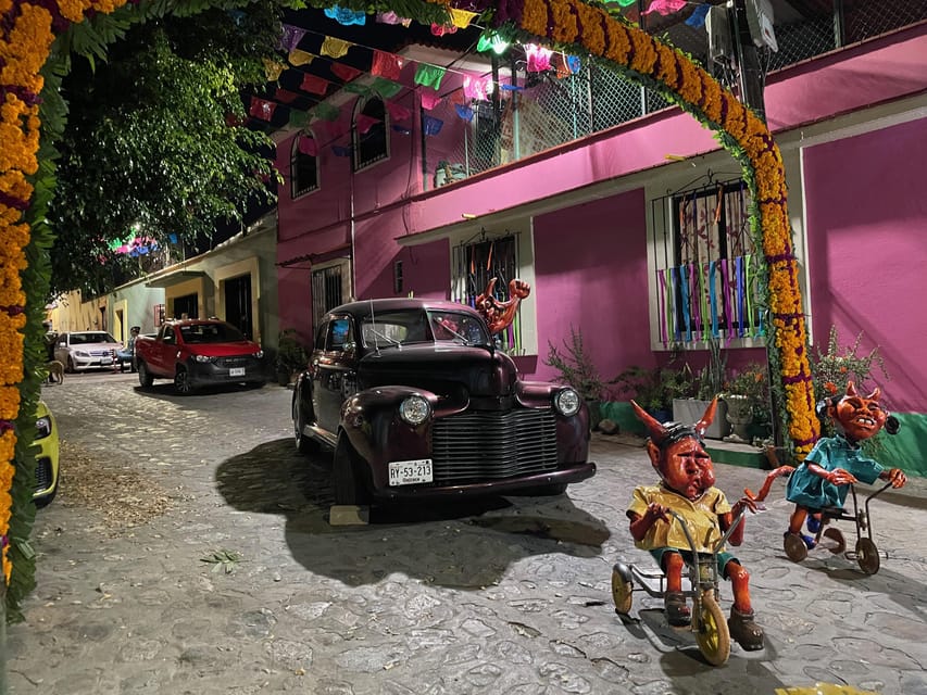 Oaxaca: Day of the Dead Evening Walking Tour with Dinner - Santo Domingo Plaza: when churches and history wear flowers