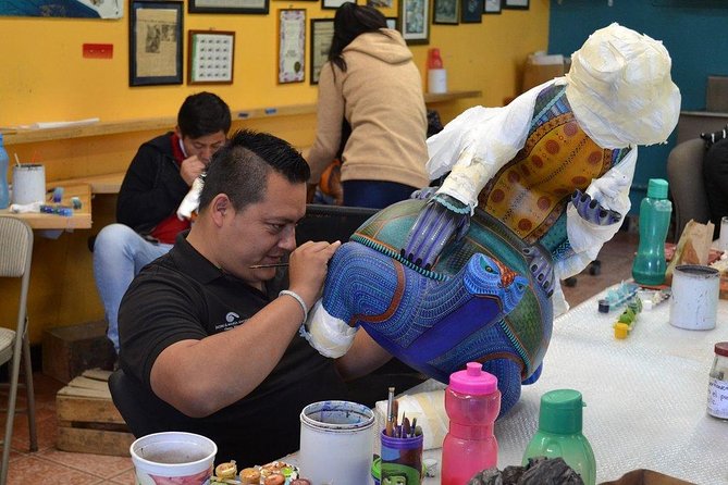 Private Day Tour including Artisan Villages of Alebrijes and Black Pottery - Ocotlán de Morelos: red clay ceramics, a weekly market on Fridays, and murals